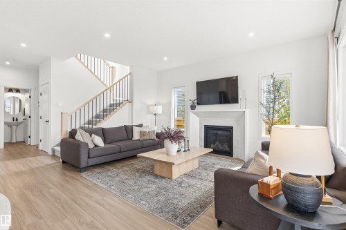 2243 Donaghey Way, Edmonton, AB - Indoor Photo Showing Living Room With Fireplace