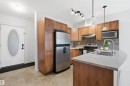 #407 802 12 St, Cold Lake, AB  - Indoor Photo Showing Kitchen With Stainless Steel Kitchen With Double Sink 