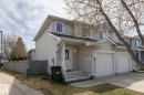 Two-story residence featuring light-colored siding and a covered front entry - 55 14603 Miller Boulevard, Edmonton, AB 