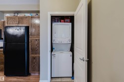 In-unit stackable washer and dryer within a dedicated closet - 