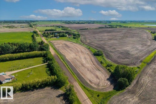 Expansive agricultural landscape featuring cultivated fields and green spaces - 0 0, Rural Sturgeon County, AB 