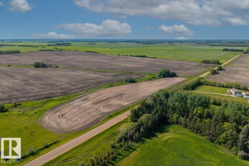 Expansive land parcel featuring a mix of cultivated fields and green spaces - 0 0, Rural Sturgeon County, AB 