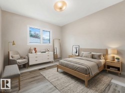 Spacious room featuring wood-finish flooring, neutral wall tones, and a contemporary ceiling light fixture - 