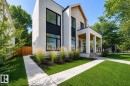 Contemporary exterior with clean lines, featuring a stone and stucco facade - 10514 134 Street, Edmonton, AB 