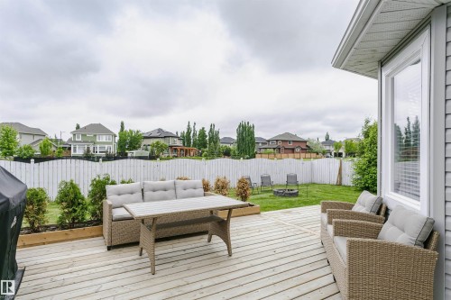 Spacious outdoor deck with natural wood planks - 5610 57 Avenue, Beaumont, AB 