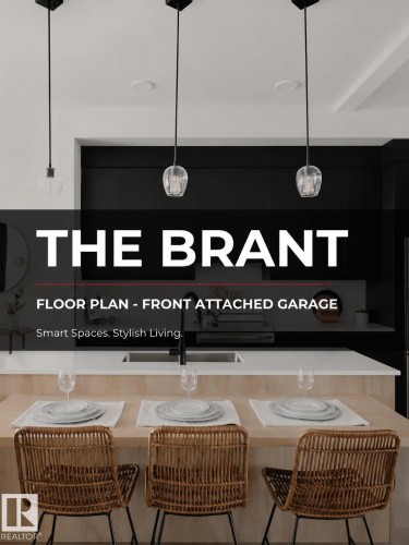 Modern kitchen island featuring a light wood-finish base and a light-toned countertop - 1092 Starling Drive, Edmonton, AB 