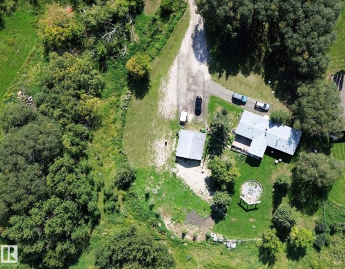 Aerial perspective showcasing a property surrounded by mature trees - 3054 28 Avenue, Edmonton, AB 