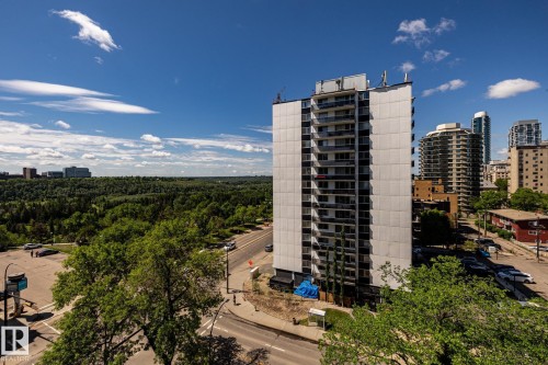 Stunning river valley views from the outdoor balcony, with the U of A visible across the river - 807 10011 116 Street, Edmonton, AB 