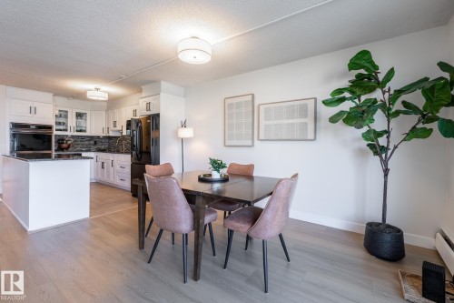 Dining area, which sits beside the patio doors - 807 10011 116 Street, Edmonton, AB 