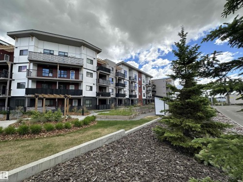 Contemporary multi-story apartment building featuring a neutral color palette - 318 1506 Tamarack Boulevard, Edmonton, AB 