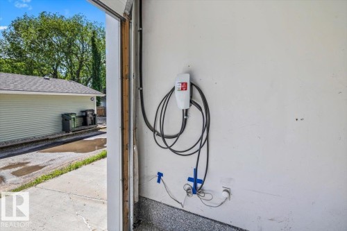 Integrated electric vehicle charging station - 10641 126 Street, Edmonton, AB 