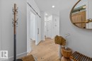 Hardwood flooring extending through the hallway - 10641 126 Street, Edmonton, AB 