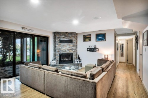 275 Poplar Crescent, Rural Wetaskiwin County, AB - Indoor Photo Showing Living Room With Fireplace