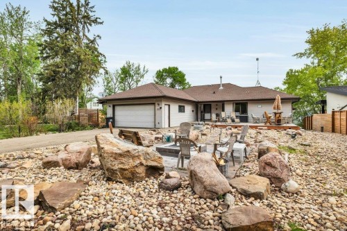 Low maintenance front yard - 275 Poplar Crescent, Rural Wetaskiwin County, AB - Outdoor With Deck Patio Veranda