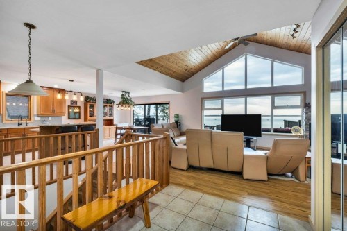 Spacious Outdoor living space to capture your lakefront experiences - 275 Poplar Crescent, Rural Wetaskiwin County, AB - Outdoor With Body Of Water With Deck Patio Veranda