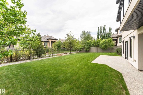 Expansive lawn area with a concrete patio - 3310 Watson Bay, Edmonton, AB 