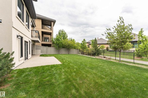 Expansive green lawn with a large concrete patio - 3310 Watson Bay, Edmonton, AB 