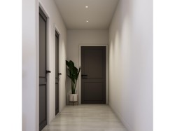 Hallway featuring light wood-finish flooring and recessed ceiling lighting - 