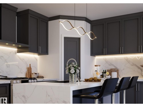 Contemporary kitchen featuring dark cabinetry with crown molding, a stainless steel range with matching hood, and quartz countertops extending to a central island with integrated seating - 10919 106 Ave, Westlock, AB 