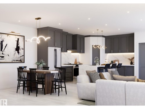 Open-concept living space featuring light wood-finish flooring - 10919 106 Ave, Westlock, AB 