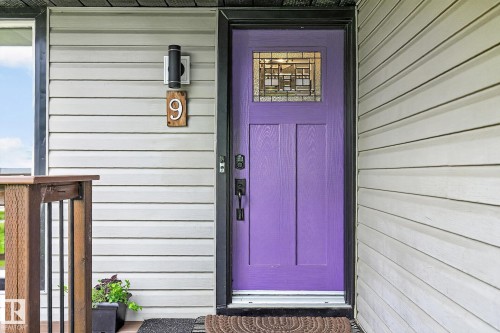 Newer front exterior door, front veranda. - 9 Millgrove Drive, Spruce Grove, AB 