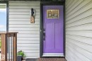 Newer front exterior door, front veranda. - 9 Millgrove Drive, Spruce Grove, AB 