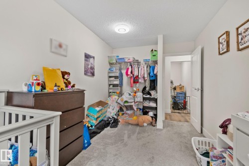 White walls complement light gray carpeting throughout this space - 115 4608 52 Avenue, Stony Plain, AB 