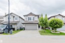 Modern two-story home featuring a combination siding exterior - 21223 58 Avenue, Edmonton, AB 