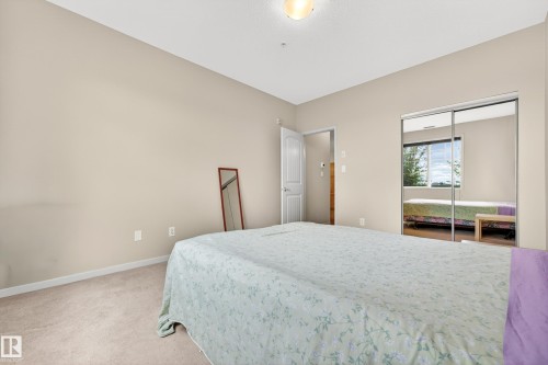 Neutral tone walls with light-colored carpeting - 133 2503 Hanna Crescent, Edmonton, AB 