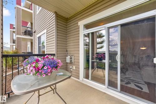 Private balcony featuring a concrete floor and black metal railing - 133 2503 Hanna Crescent, Edmonton, AB 