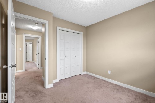 Carpeted room with neutral-toned walls - 12809 203A, Edmonton, AB 