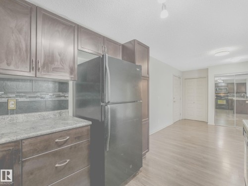 Kitchen - 117 6070 Schonsee Way, Edmonton, AB 