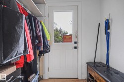 White paneled door with glass insert - 