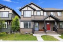 Contemporary multi-unit dwelling with a combination of horizontal siding and vertical accents - 2833 Chokecherry Place, Edmonton, AB 