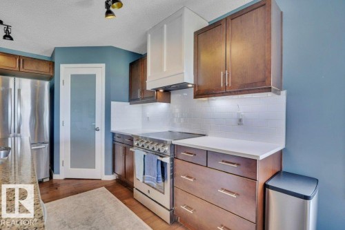 482 Reed Cres Leduc AB. Custom built hood fan with motion sensor fan and light . - 482 Reed Crescent, Leduc, AB 