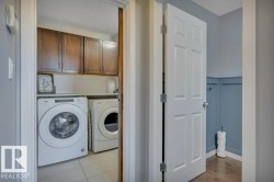 482 Reed Cres Leduc AB. Folding counter with storage above. Sliding barn door with motion señor lighting. - 