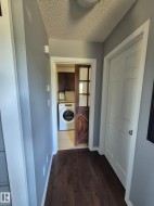 Barn door access to laundry room and garage. - 