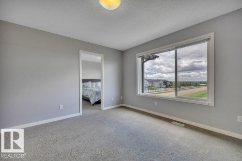 482 Reed Cres Leduc, AB .Located upstairs this larger family room has fantastic view. - 482 Reed Crescent, Leduc, AB 