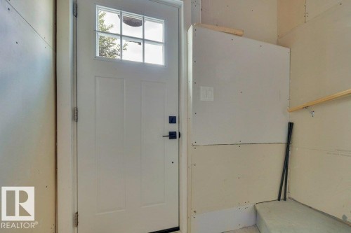 482 Reed Cres Leduc, AB . Outside access door to basement . - 482 Reed Crescent, Leduc, AB 