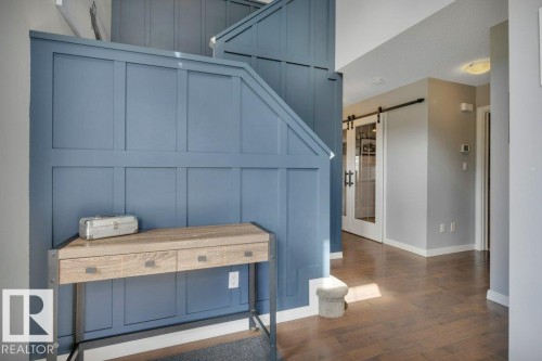482 Reed Cres Leduc AB. Custom wainscoting and hardwood floors - 482 Reed Crescent, Leduc, AB 