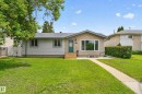 Ranch-style residence featuring a brick facade and light-colored siding - 13427 114 Street, Edmonton, AB 