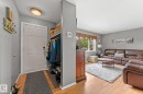 Entryway with wood-finish flooring and integrated storage - 11219 134A Avenue, Edmonton, AB 