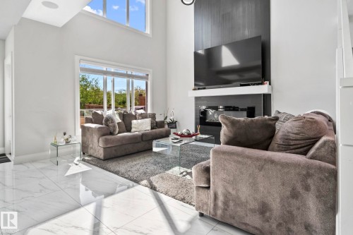 6423 175 Avenue Nw, Edmonton, AB - Indoor Photo Showing Living Room With Fireplace