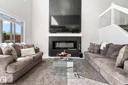 6423 175 Avenue Nw, Edmonton, AB - Indoor Photo Showing Living Room With Fireplace