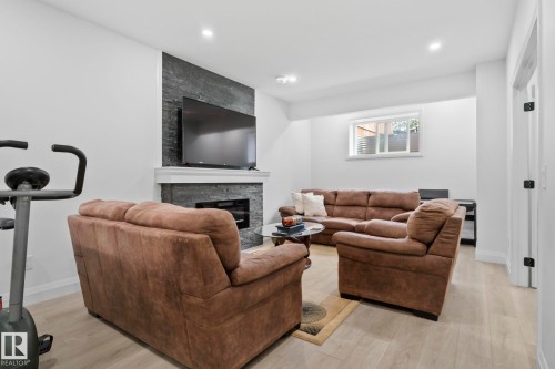 6423 175 Avenue Nw, Edmonton, AB - Indoor Photo Showing Living Room With Fireplace