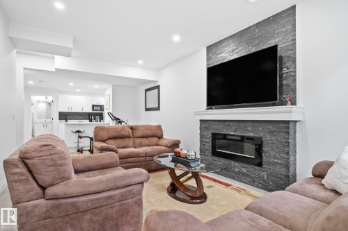 6423 175 Avenue Nw, Edmonton, AB - Indoor Photo Showing Living Room With Fireplace