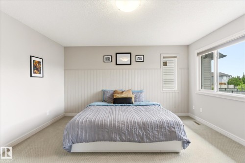Neutral-toned bedroom with light gray walls and white trim - 3685 Westcliff Way, Edmonton, AB 