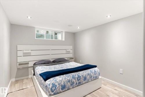 Recessed lighting illuminates this room featuring light wood-finish flooring and a high-set window - 3685 Westcliff Way, Edmonton, AB 