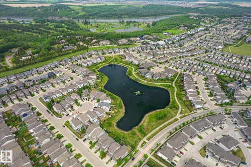 Aerial view of a residential community featuring a central pond - 3685 Westcliff Way, Edmonton, AB 
