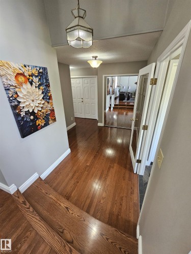Wide front entry area, leads to main floor office/den/bedroom - 15 Paquette Place, St. Albert, AB 